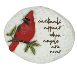 Decorative stone with a red cardinal illustration and text on a white background
