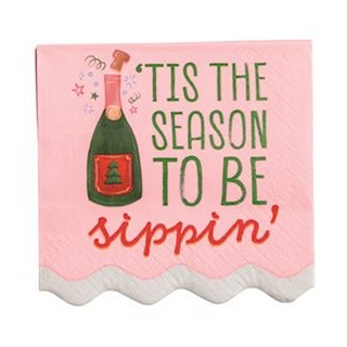 Decorative sign with a bottle graphic and text 'Tis the season to be sippin' on a pink background.