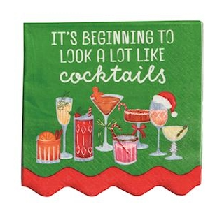 Napkin with Christmas cocktail design and text 'It's beginning to look a lot like cocktails' on a green background.
