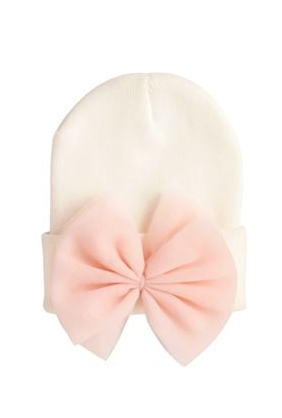 White hat with a pink bow on a white background