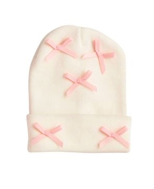 White beanie with pink bows on a white background