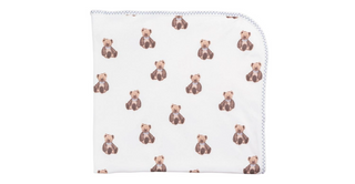 White blanket with teddy bear pattern on a white background