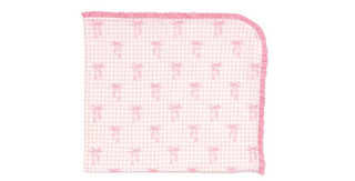 Pink gingham blanket with pink bows on a white background