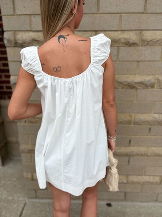 White Mini Dress with Floral Details