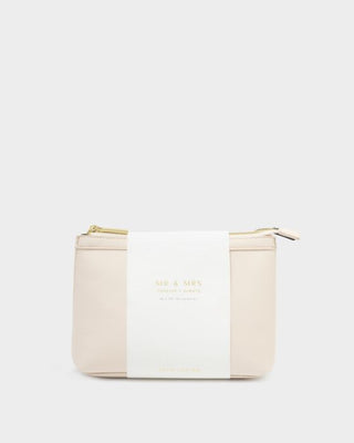 Beige and white pouch with 'Mr & Mrs' branding on a light gray background