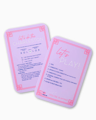 Two purple cards with red text on a white background