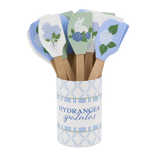 Set of spatulas with floral designs in a container labeled 'Hydrangea spatulas'.
