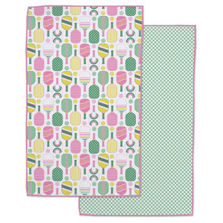Two patterned cloths, one with a colorful geometric design and the other with a green checkered pattern, on a white background.