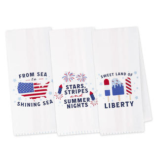 Three decorative towels with patriotic designs on a white background