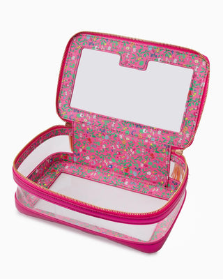 Pink floral-patterned makeup case with mirror on a white background
