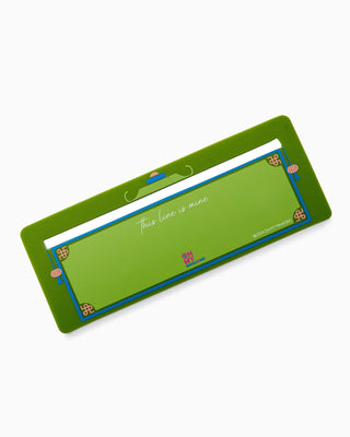 Green ruler with text on a white background