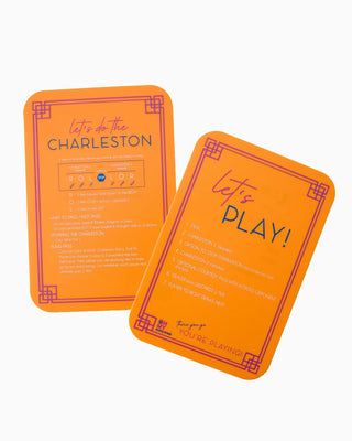 Two orange cards with purple text on a white background