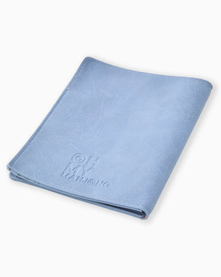 Blue folio with 'Oh My, Mahjong' branding on a white background
