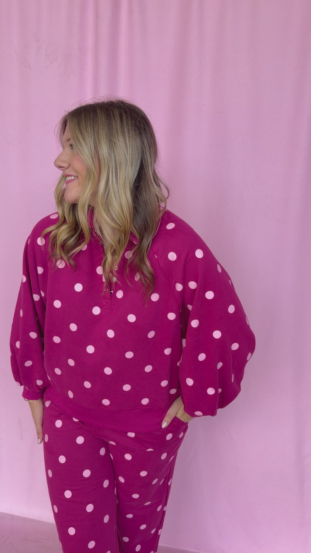 girl wearing a polka dot set 