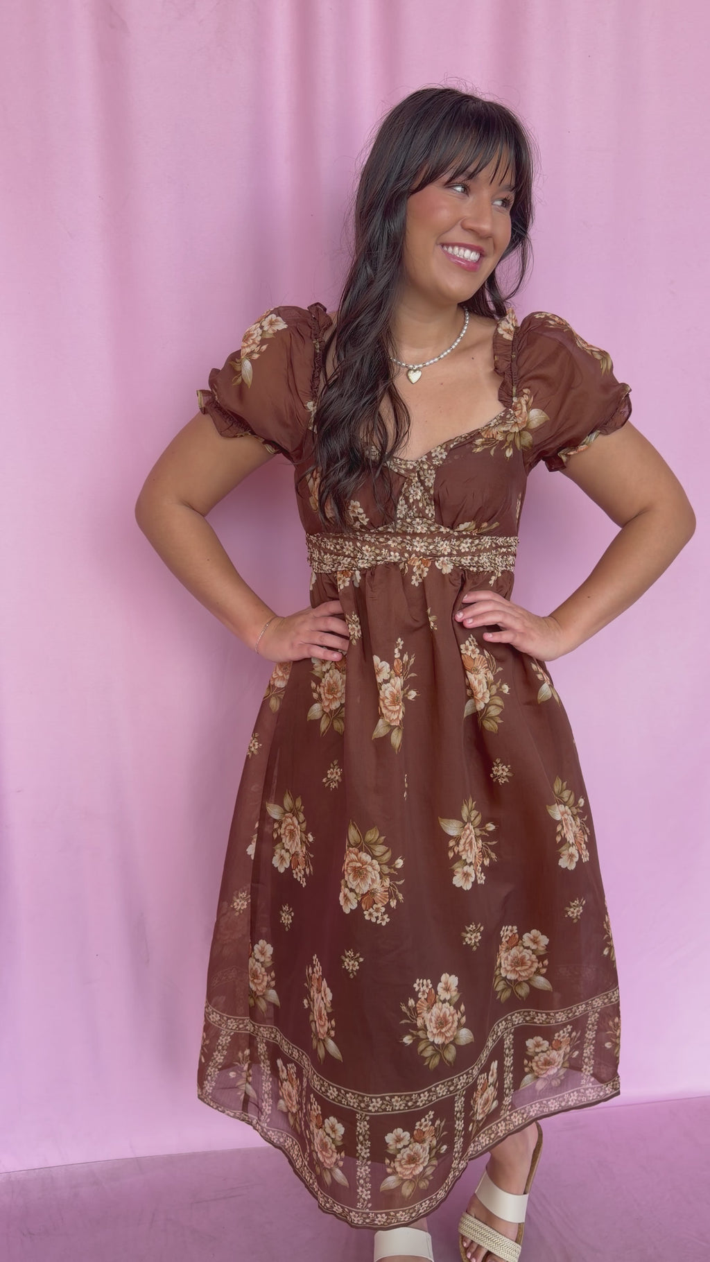Girl wearing a brown dress