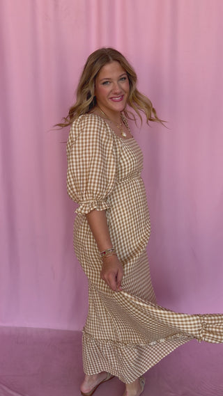 girl wearing gingham dress