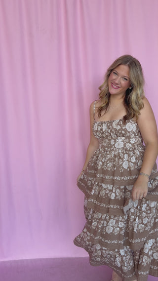 girl wearing a floral dress