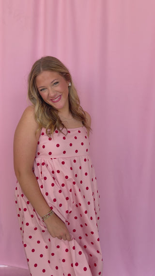 girl wearing a polka dot dress