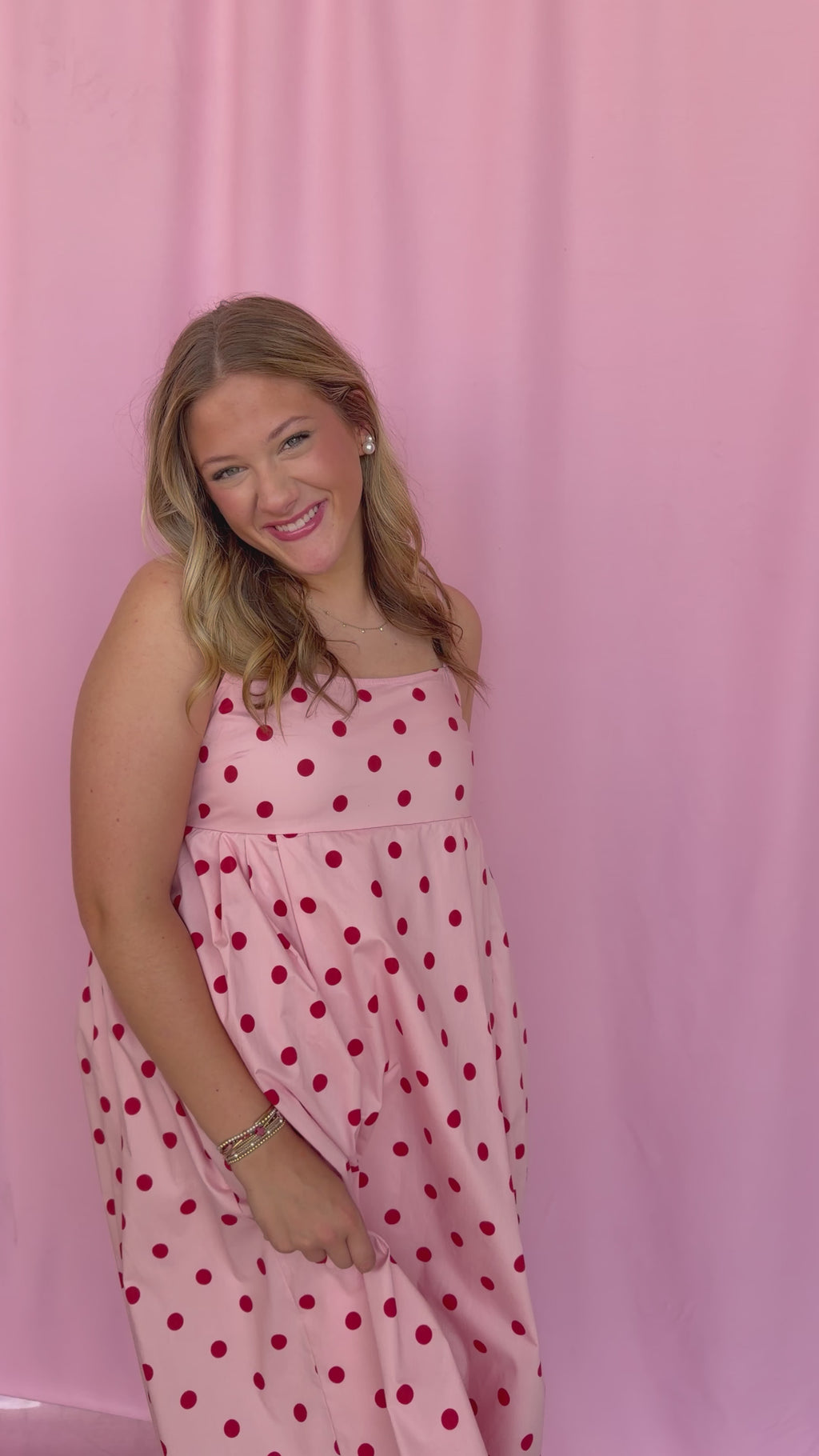 girl wearing a polka dot dress