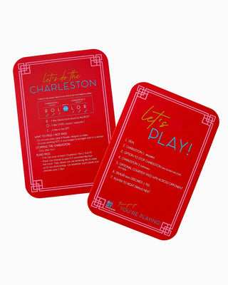 Two red playing cards with text on a white background