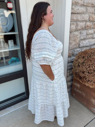 white floral midi dress with sleeves 