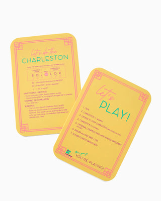Two yellow cards with green text on a white background