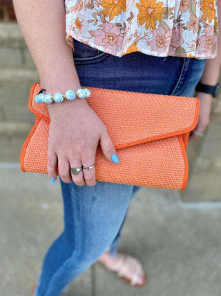 Orange Woven Clutch