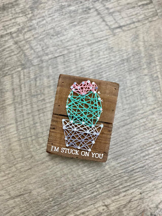 Stick On You String Sign